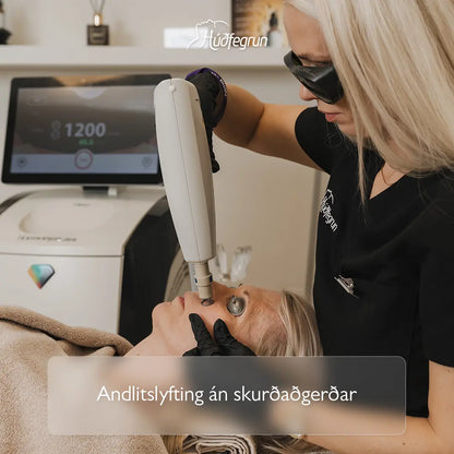 „Laserlyfting hjá Húðfegrun með tækni frá Alma Lasers sem þéttir húð, eykur kollagen og skerpir andlitsdrætti án skurðaðgerðar. Mynd notuð í vefverslun Húðfegrunar til að sýna öfluga og sársaukalausa anti-aging meðferð.“
